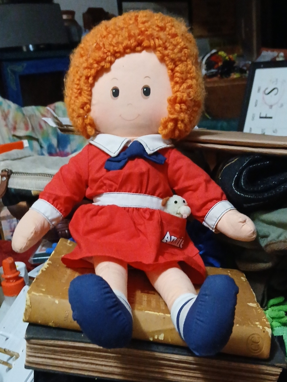 KNICKERBOCKER,ANNIE.Red Dress Plush Doll with Orange Curly Hair and Navy Shoes